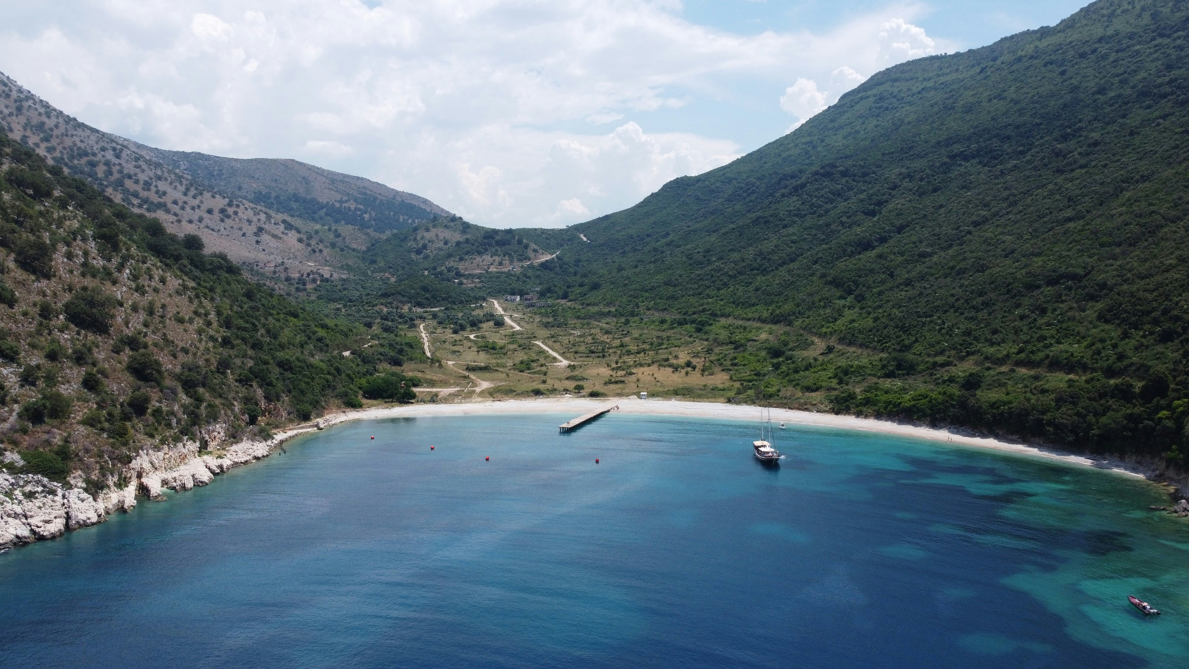 a large body of water surrounded by mountains