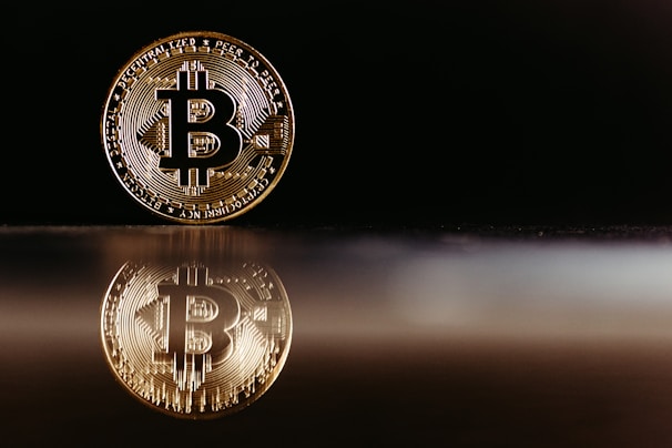 a bit coin sitting on top of a table