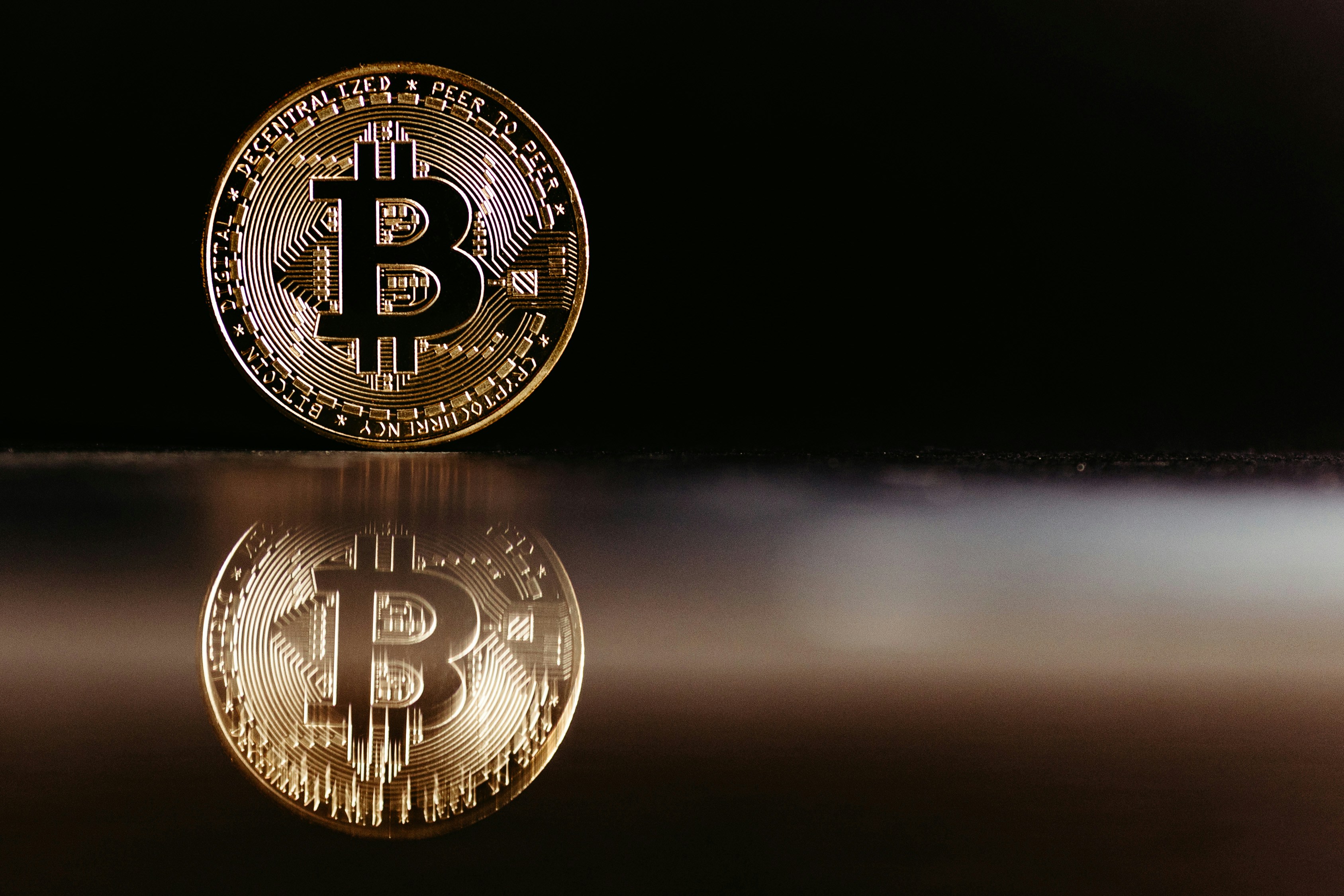 a bit coin sitting on top of a table