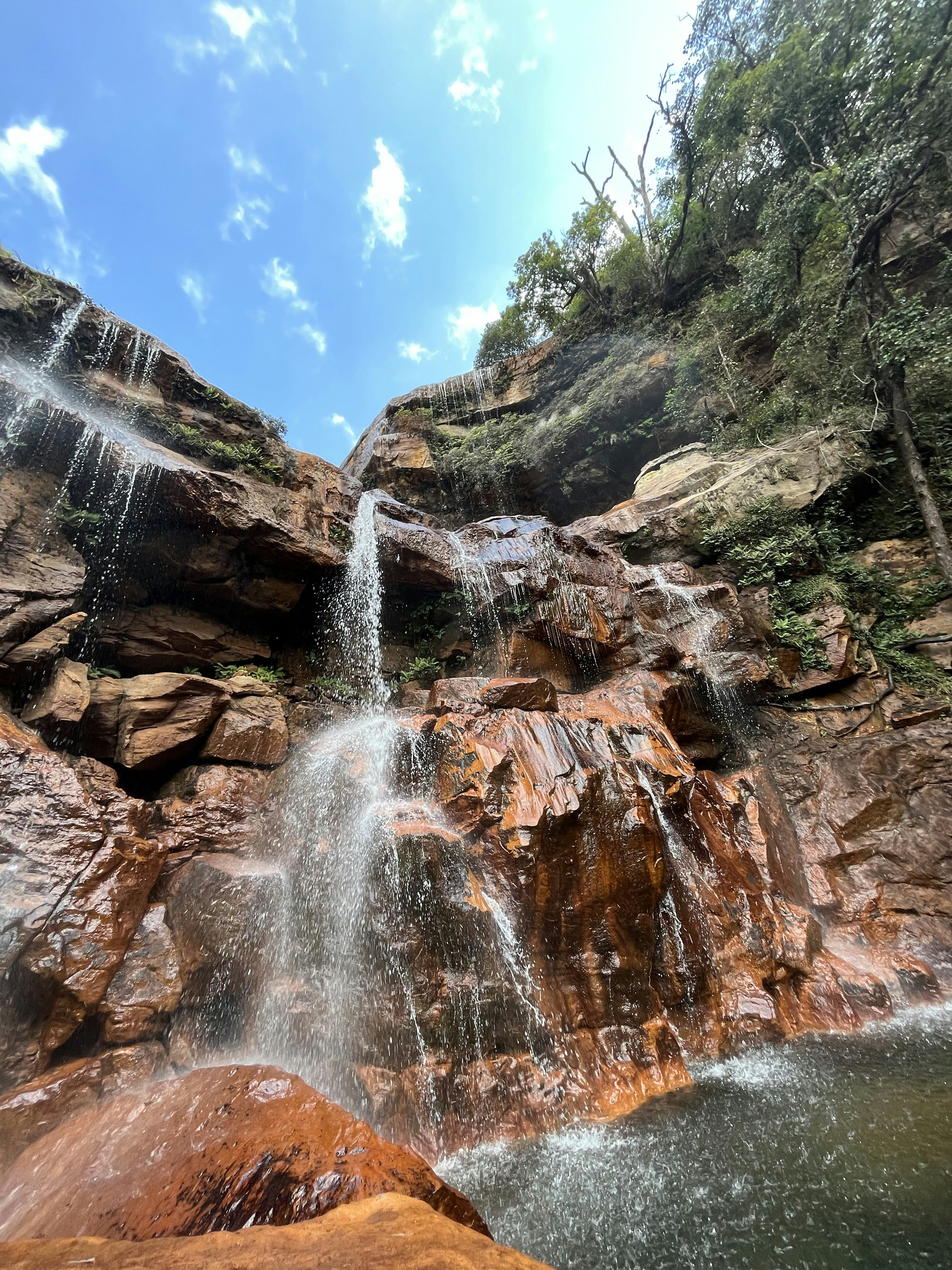 a large waterfall with lots of water coming out of it