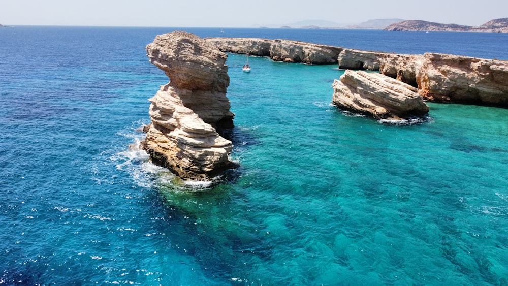 a body of water that has some rocks in it