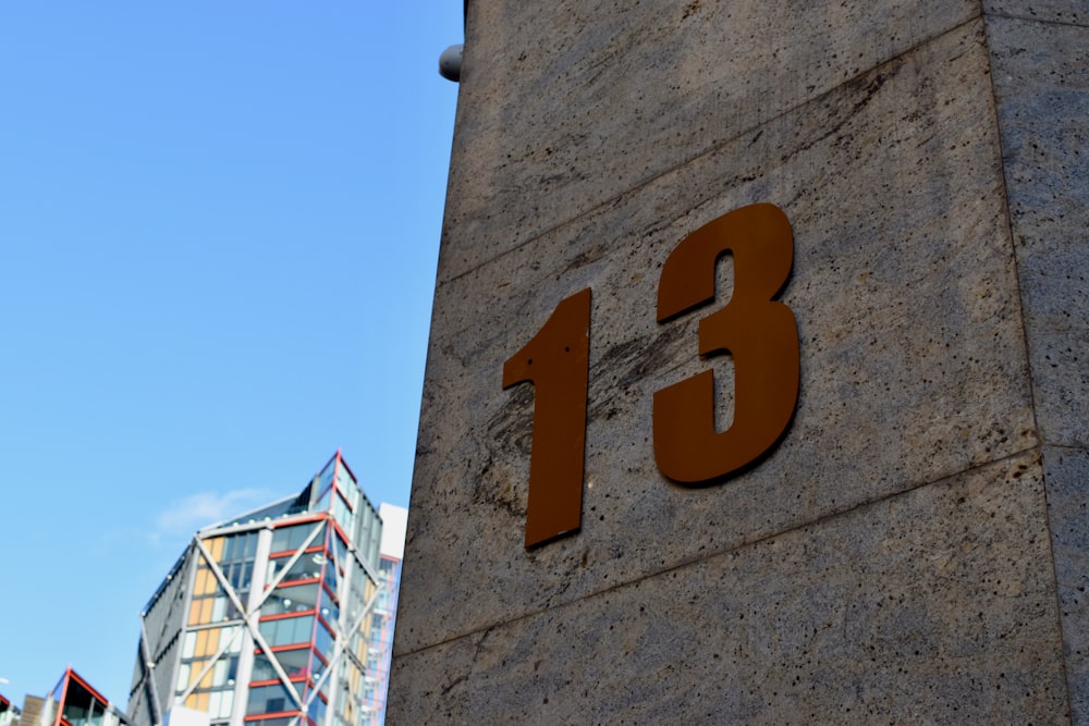 a close up of a number on a building
