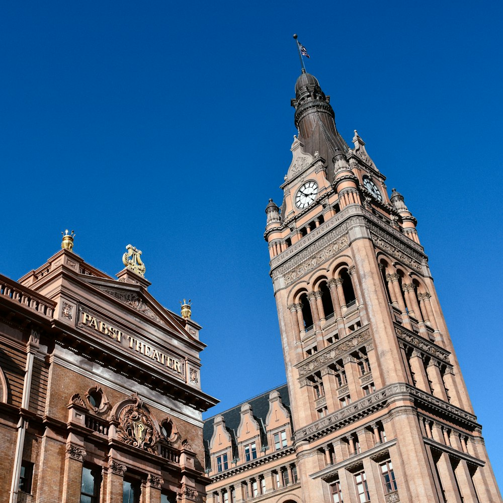 a tall building with a clock on the top of it