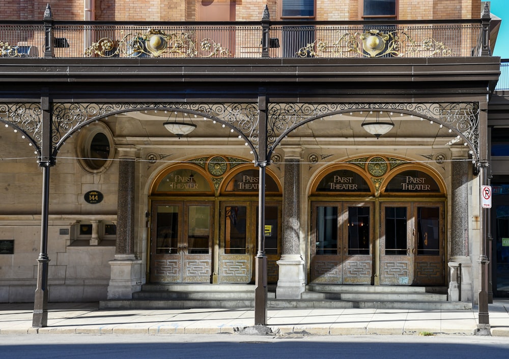 an old building with a clock on the front of it