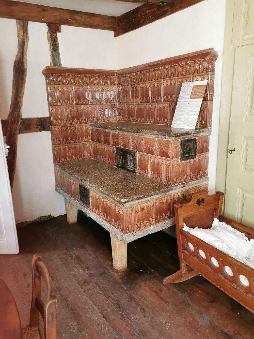 a room with a bed and a bench in it
