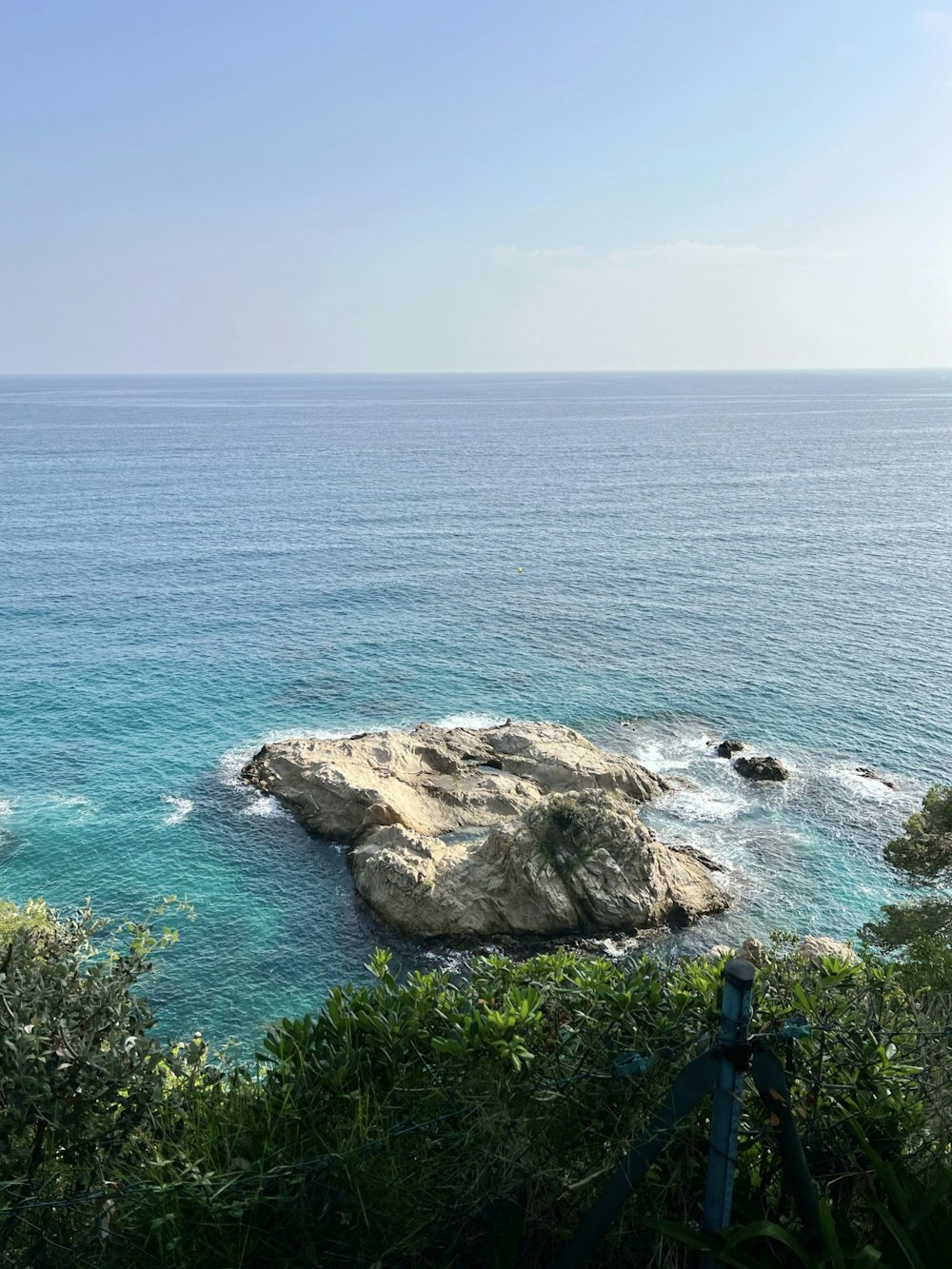 a view of the ocean from a cliff