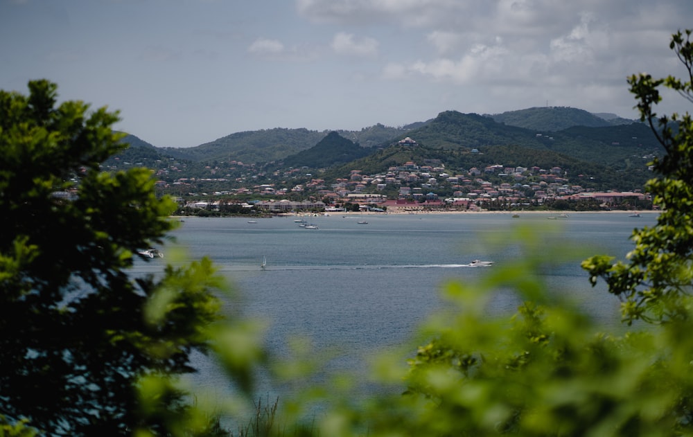 a body of water with a boat in the distance