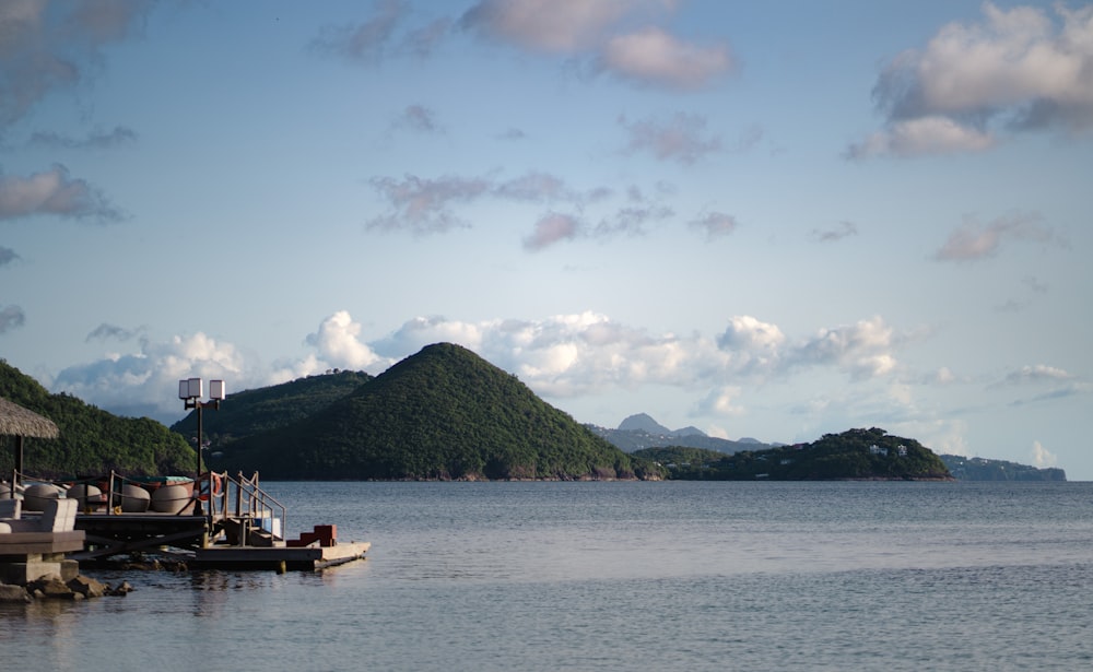 a body of water with a boat in the middle of it