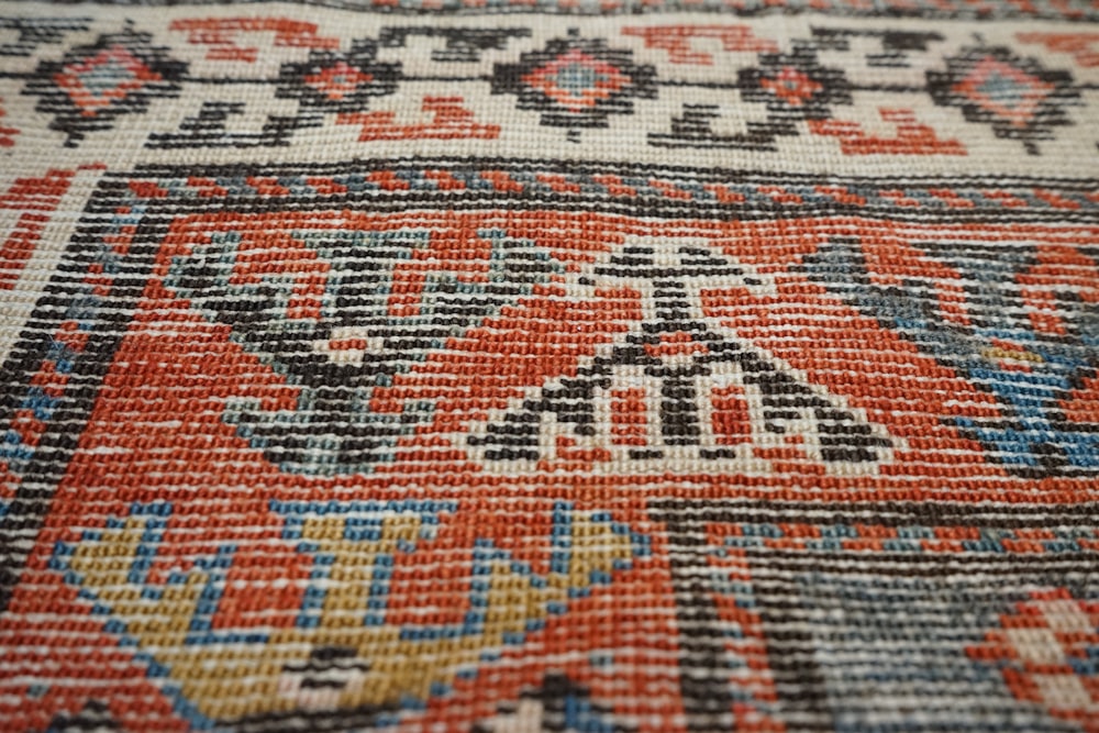 a close up view of a colorful rug