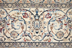 a rug with a floral design on it