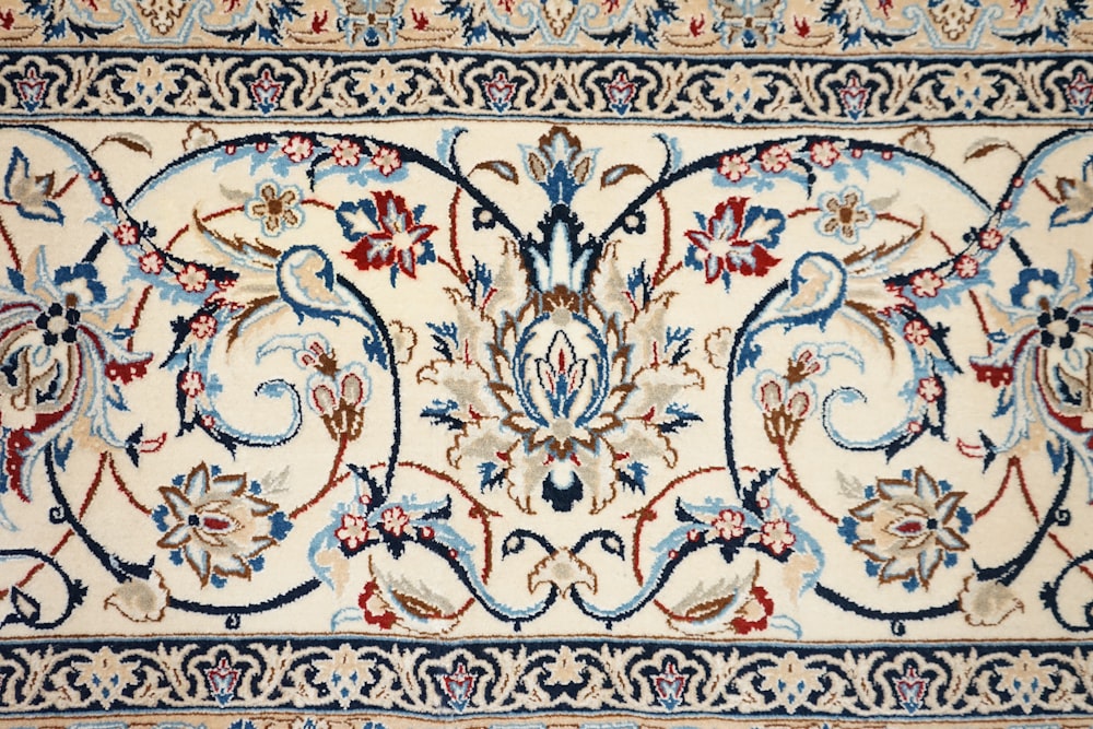 a rug with a floral design on it