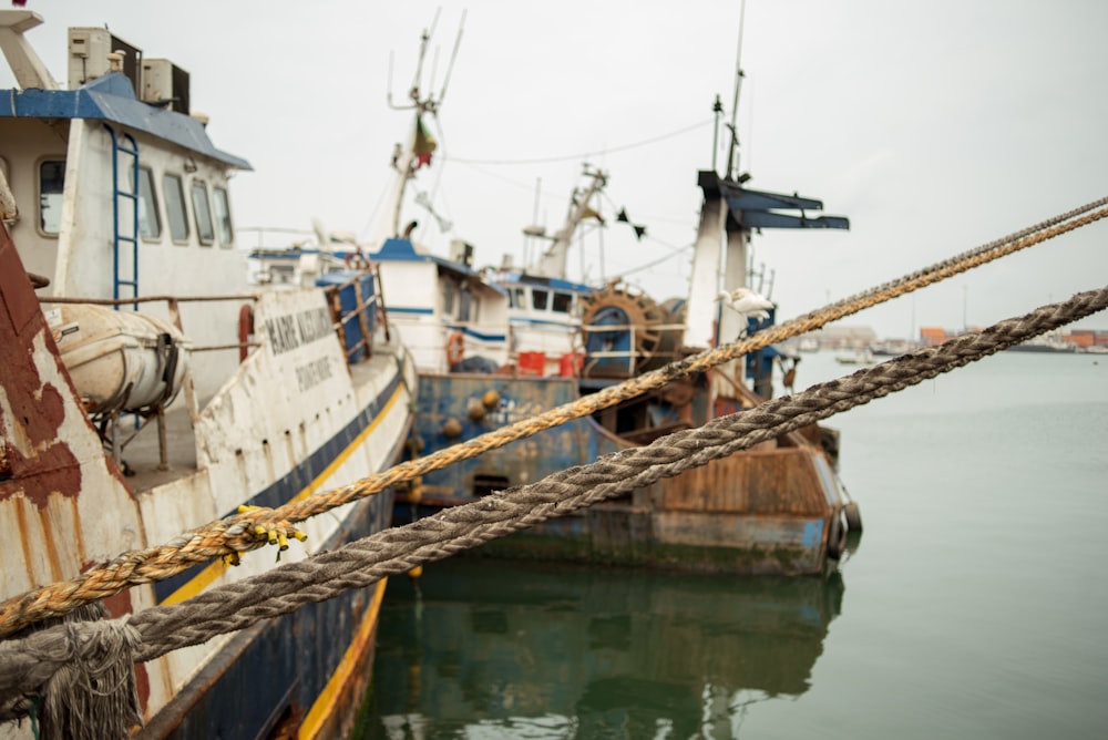 a couple of boats that are sitting in the water