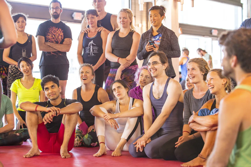 Students gathered and laughing together after a community class