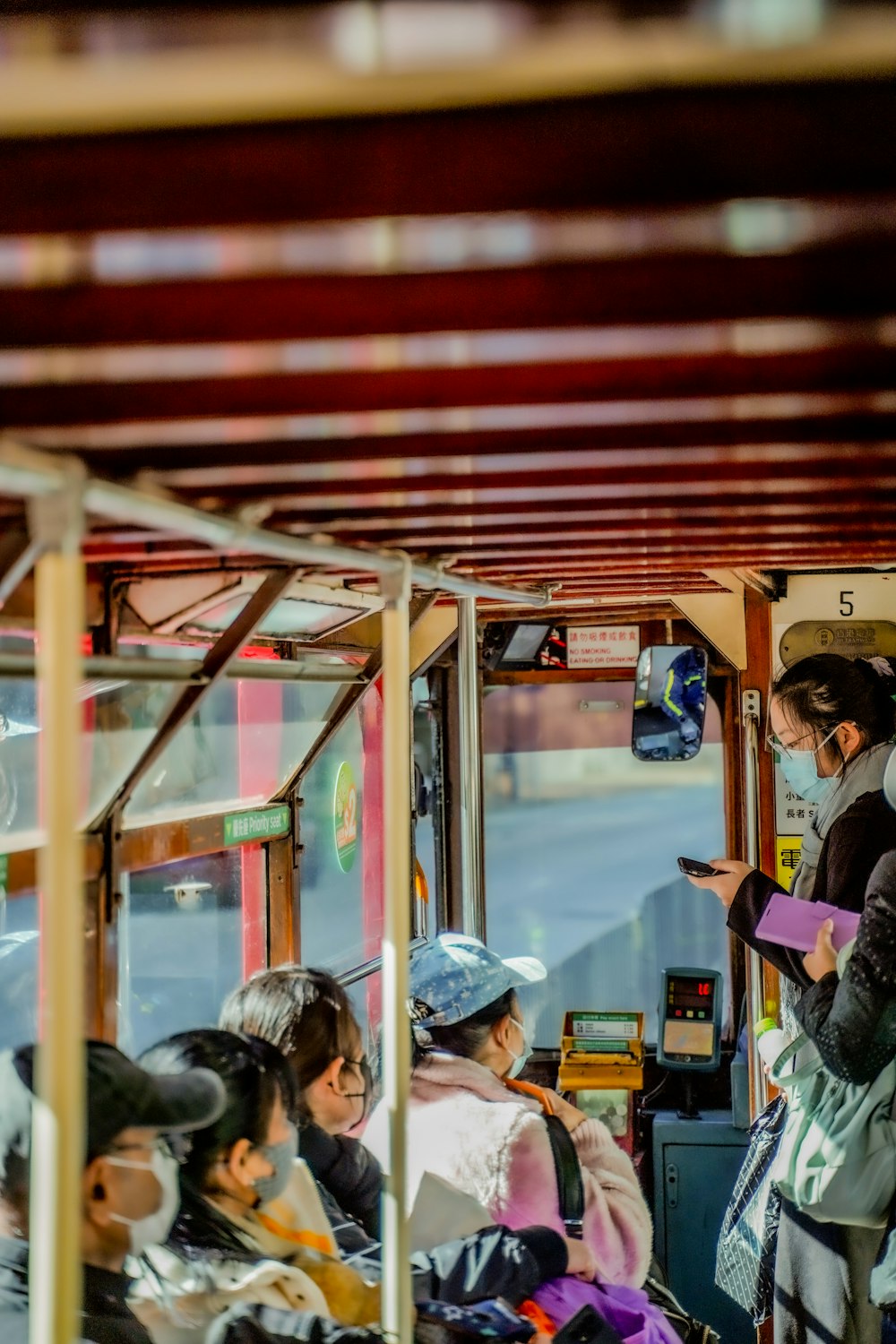 a group of people riding on a bus