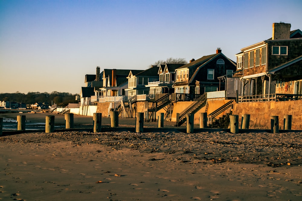 a row of houses next to a body of water