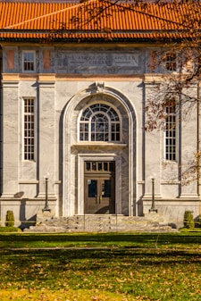 a large building with a clock on the front of it