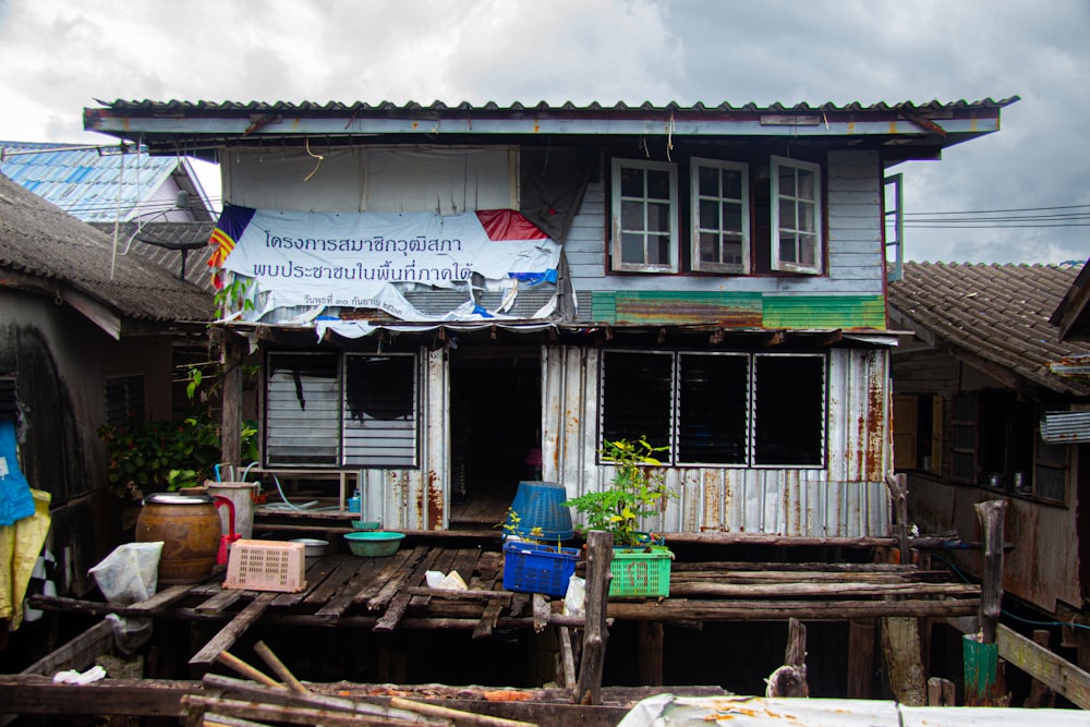 a house with a sign on the side of it