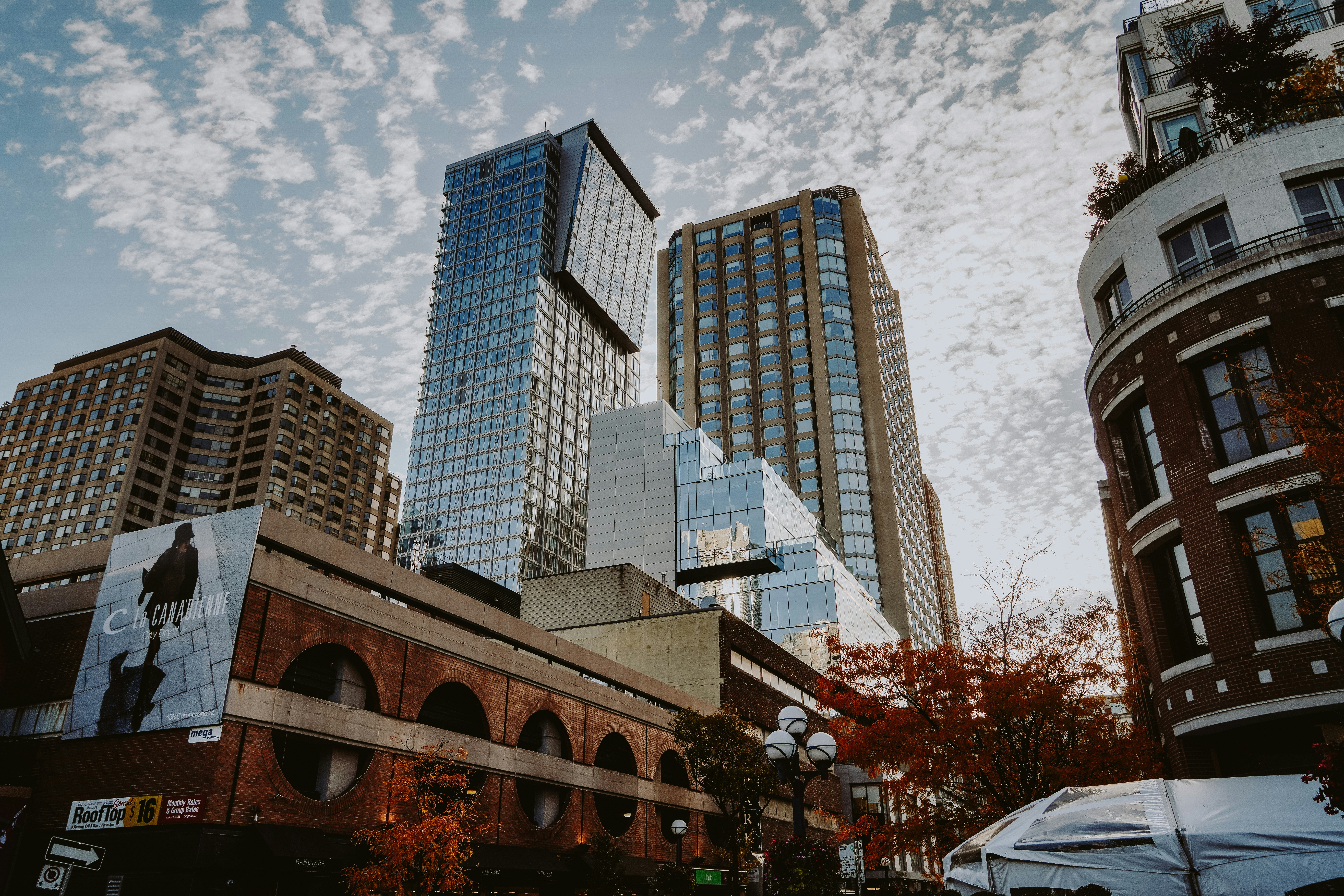 a group of tall buildings sitting next to each other