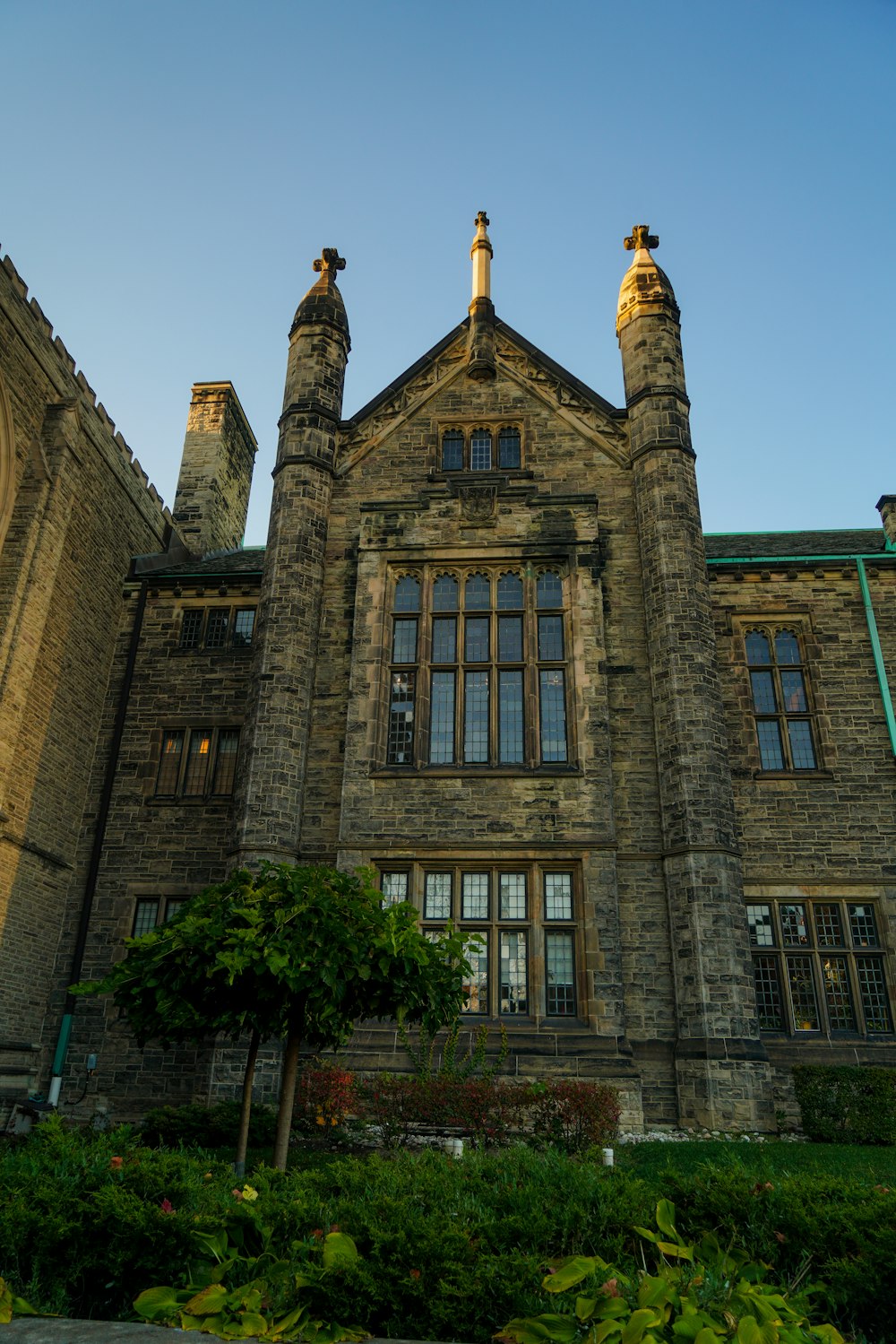 a large stone building with a clock tower