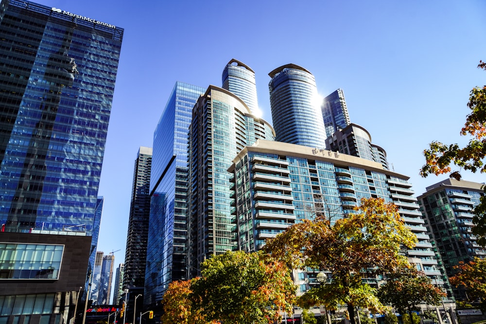 a group of tall buildings sitting next to each other