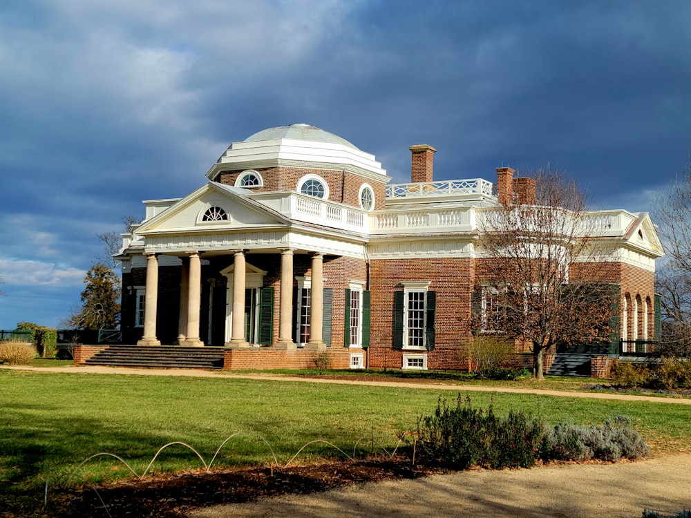 a large brick building with columns and pillars