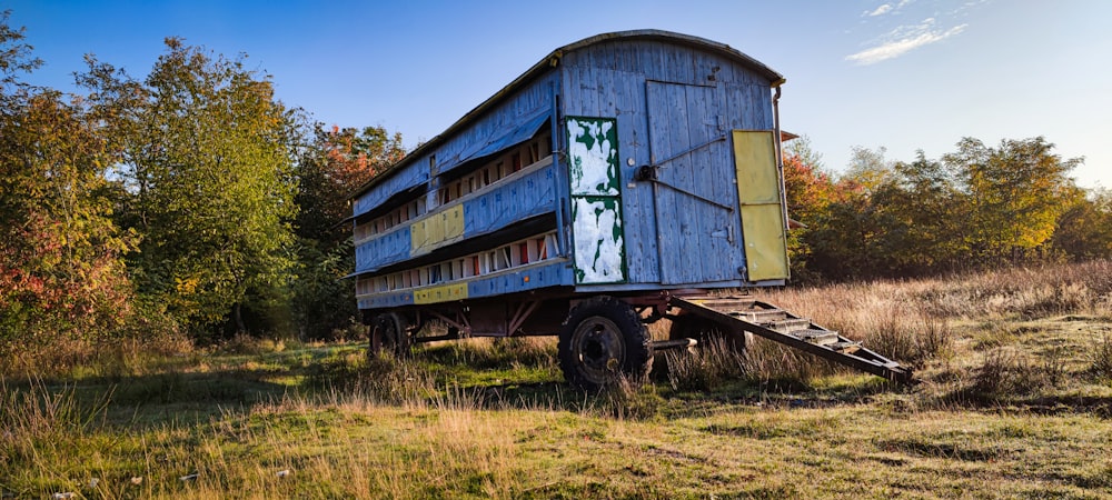 an old truck with a house on the back of it