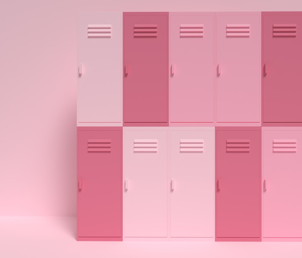 a row of pink lockers against a pink background