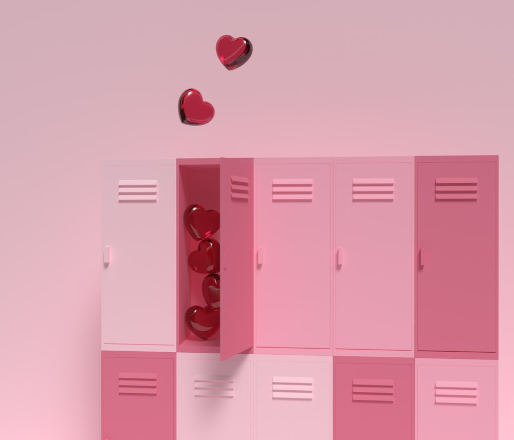 a pink locker with hearts floating out of it