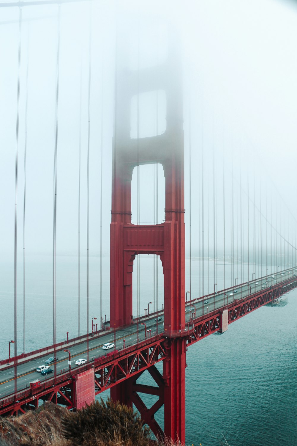 a foggy view of the golden gate bridge