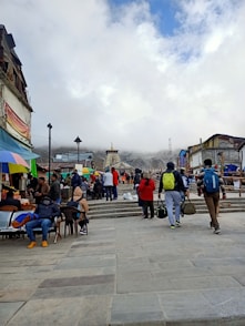 a group of people walking down a street
