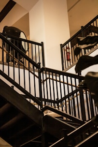 a staircase leading to a bed in a room