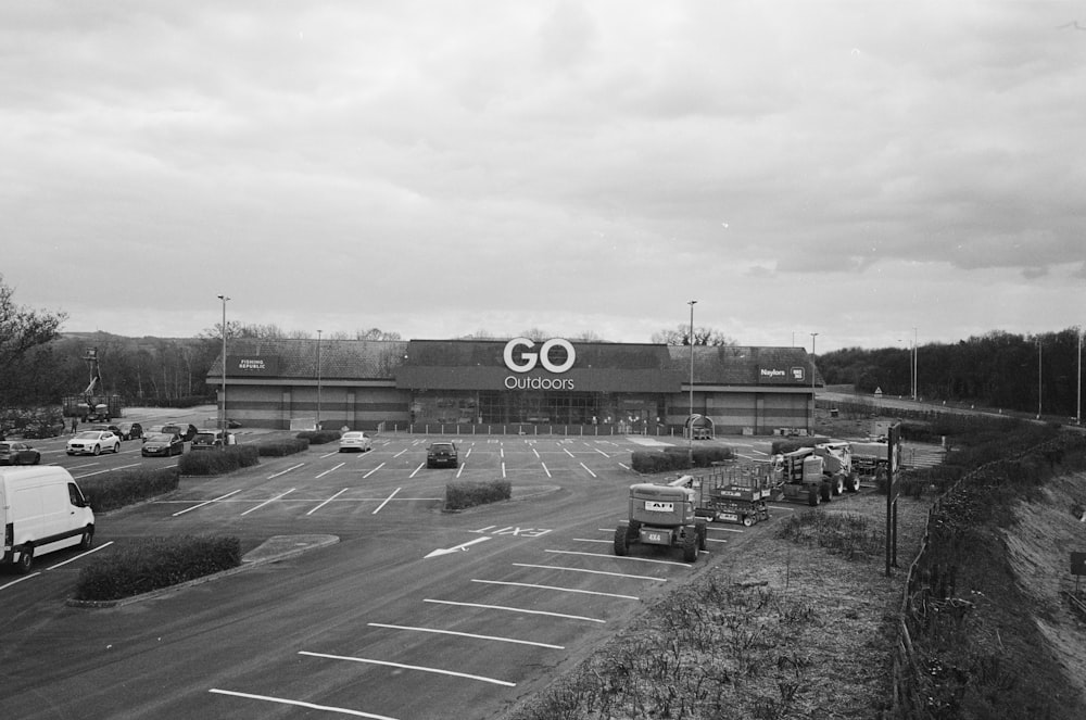 a black and white photo of a go shopping center