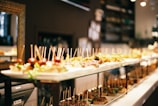 a buffet line with a variety of appetizers