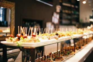 a buffet line with a variety of appetizers