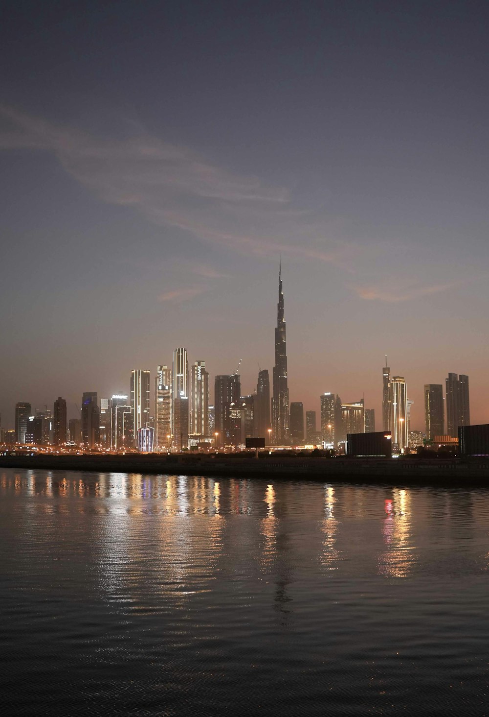 a view of a city at night from across the water