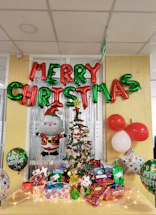 A professional office setting with a team discussing gifts.