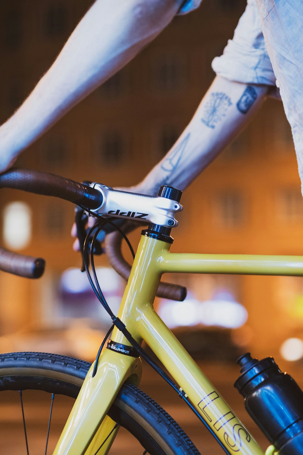 a close up of a person riding a bike