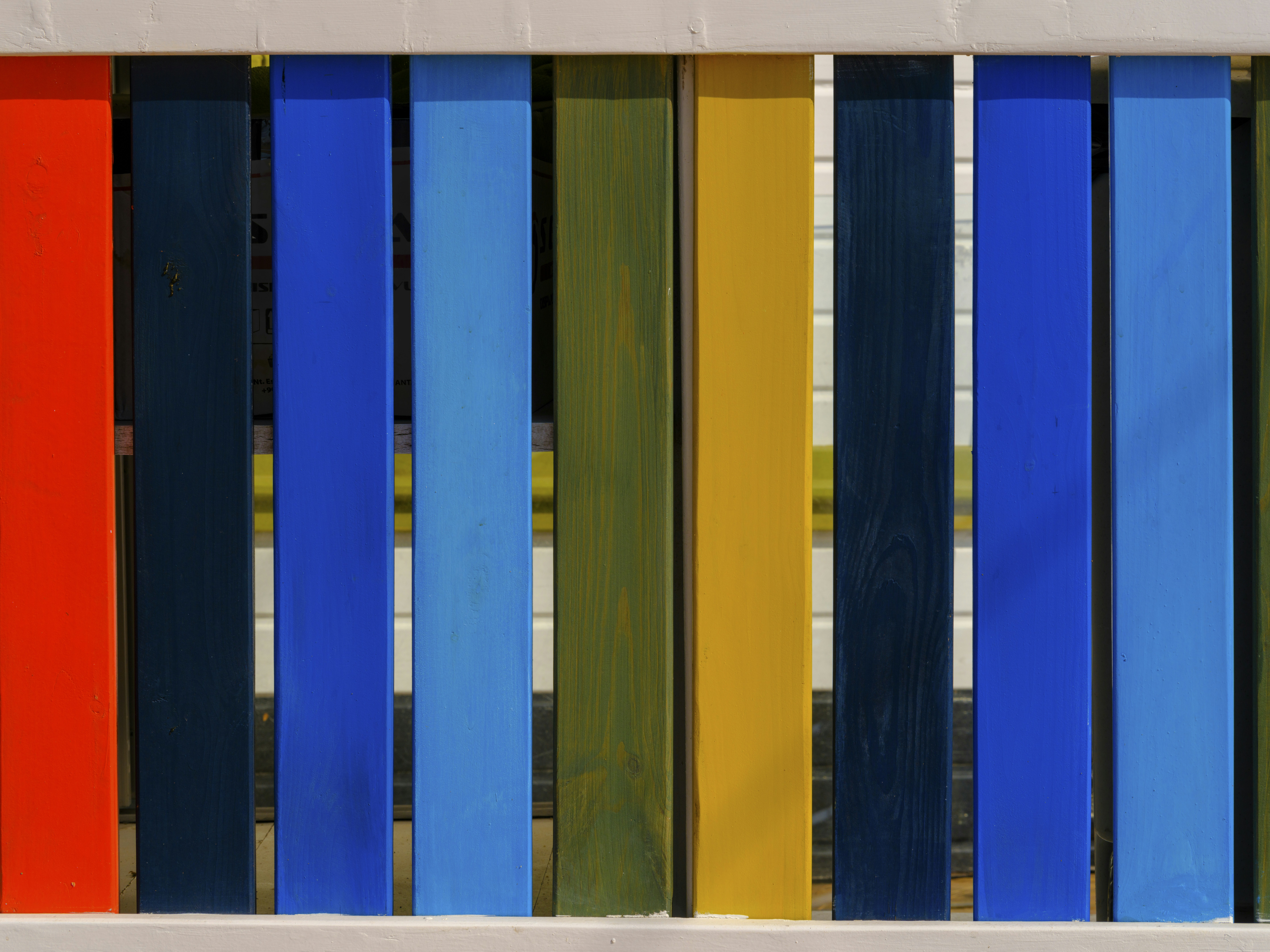 A close up of a multicolored wooden fence photo – Free Board Image on ...