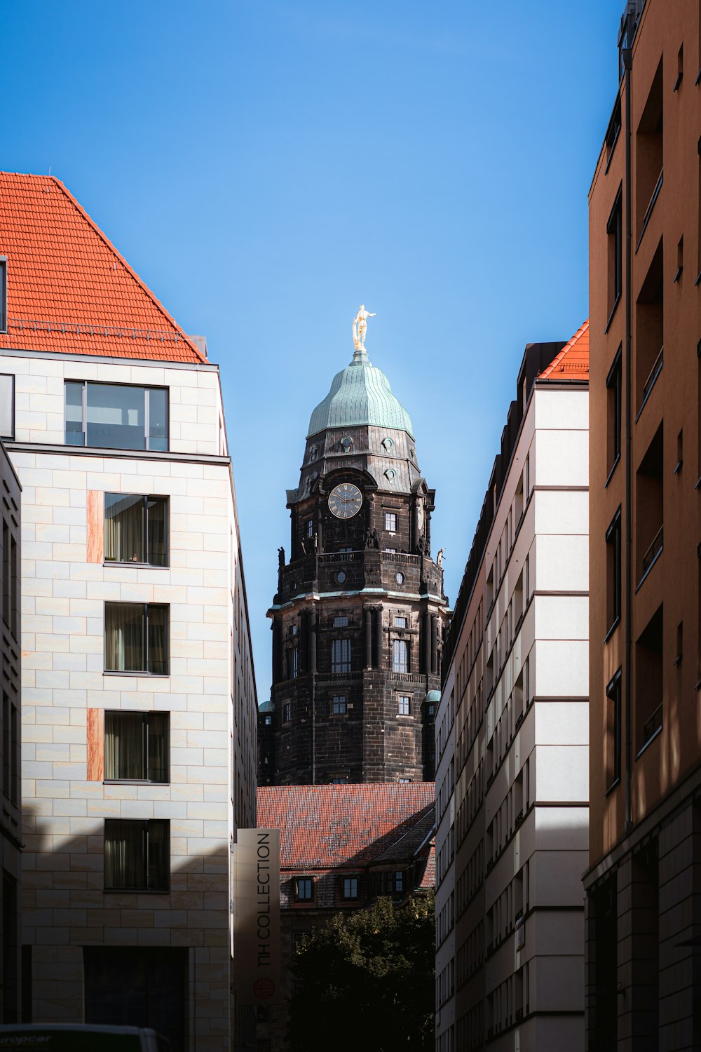 a tall building with a clock on the top of it