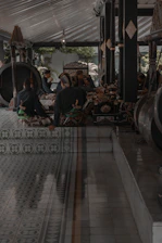A warmly lit traditional Mardin interior with musicians playing the ney and saz.