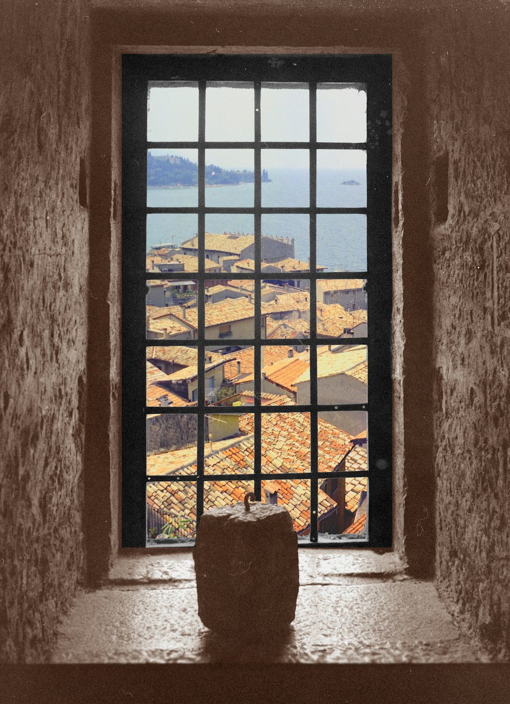 a window with a view of a city outside