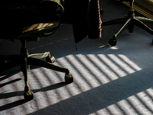 a chair with a tie sitting on top of it