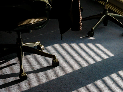 a chair with a tie sitting on top of it