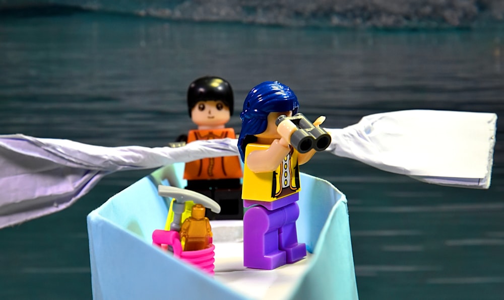 a couple of legos that are on a boat