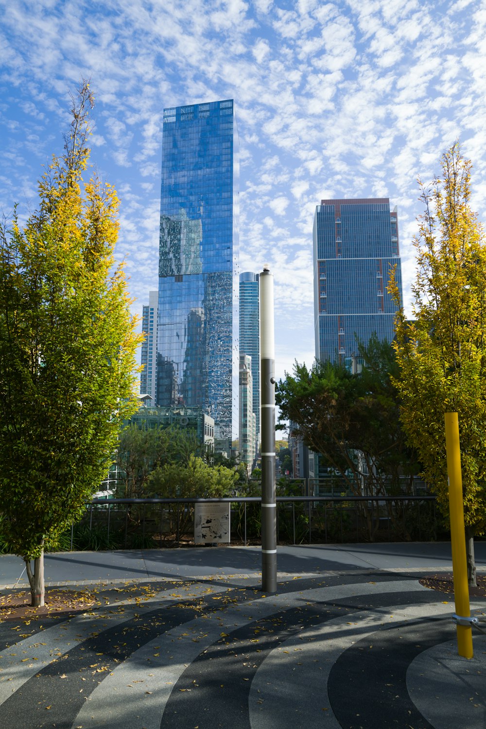 a view of a city with tall buildings in the background