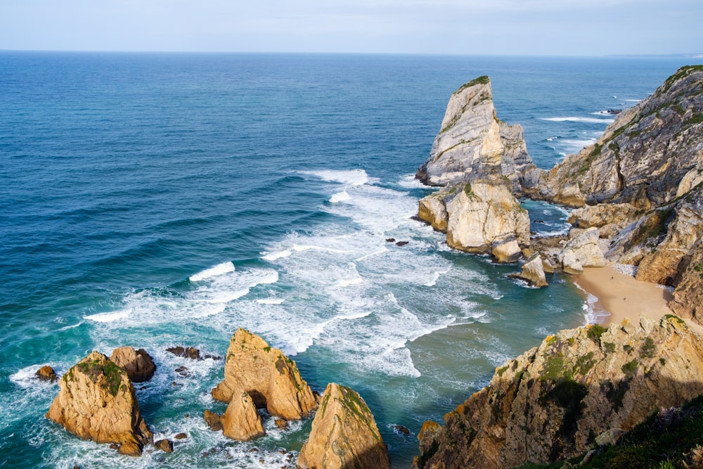 a view of the ocean from the top of a cliff