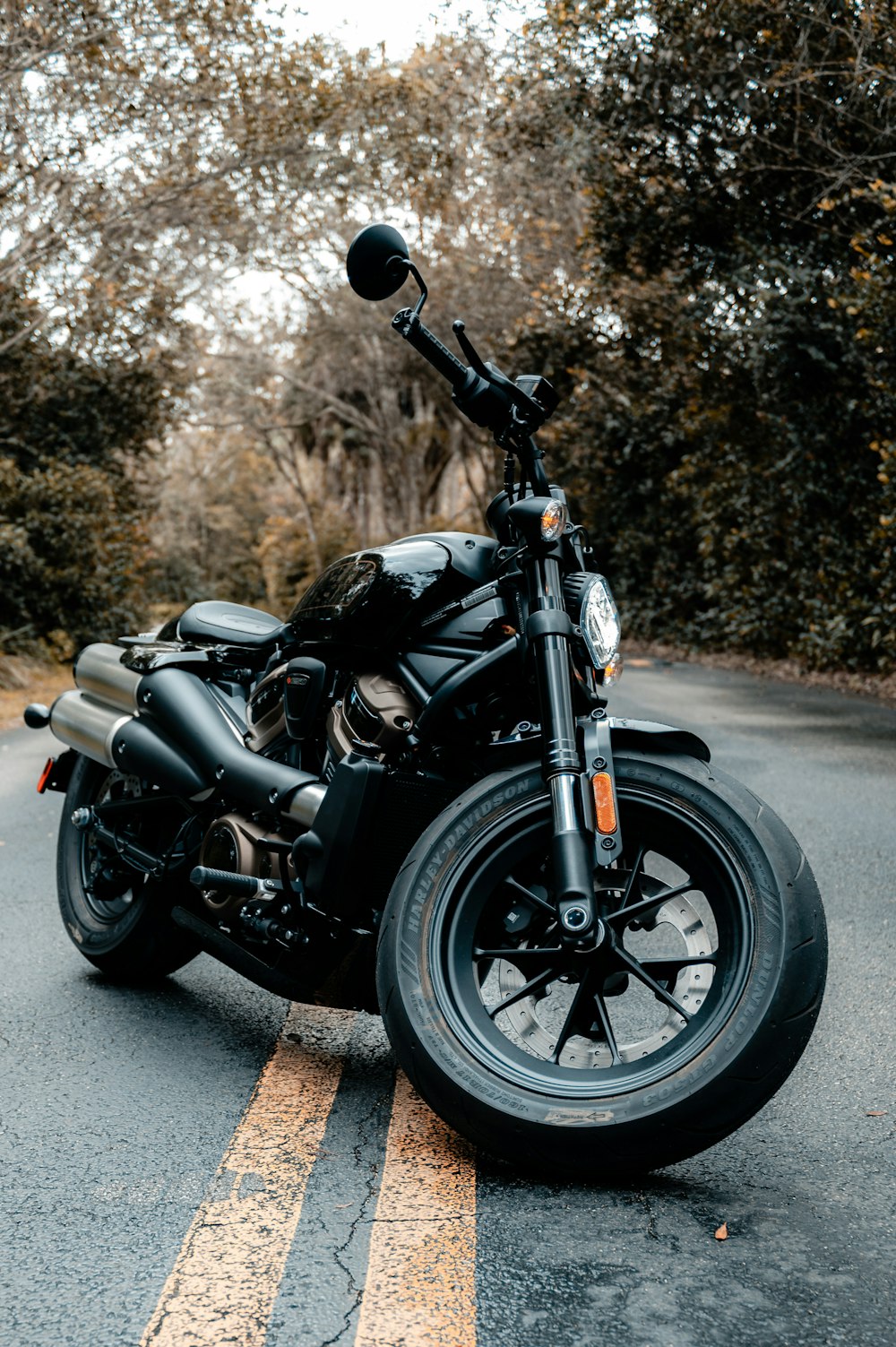 a motorcycle parked on the side of the road