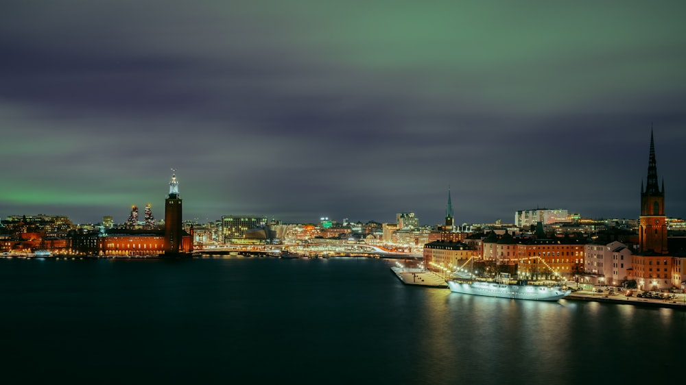 a view of a city at night from across the water