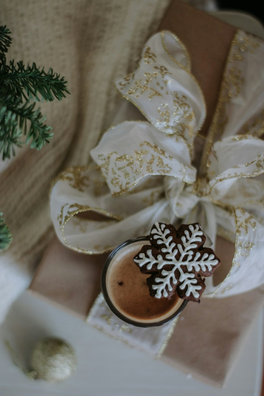 a cup of hot chocolate with a snowflake on top