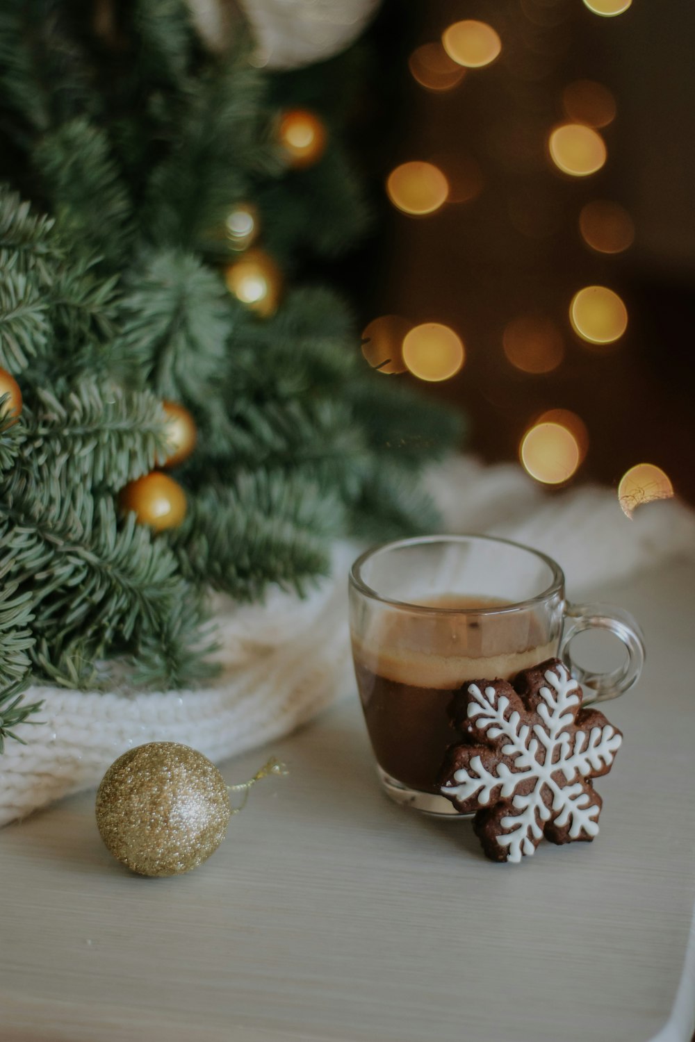 a cup of hot chocolate with a snowflake on it